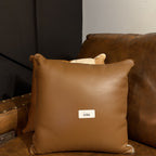 Brown & White Cowhide Accent Pillow – 16 × 16 Inches