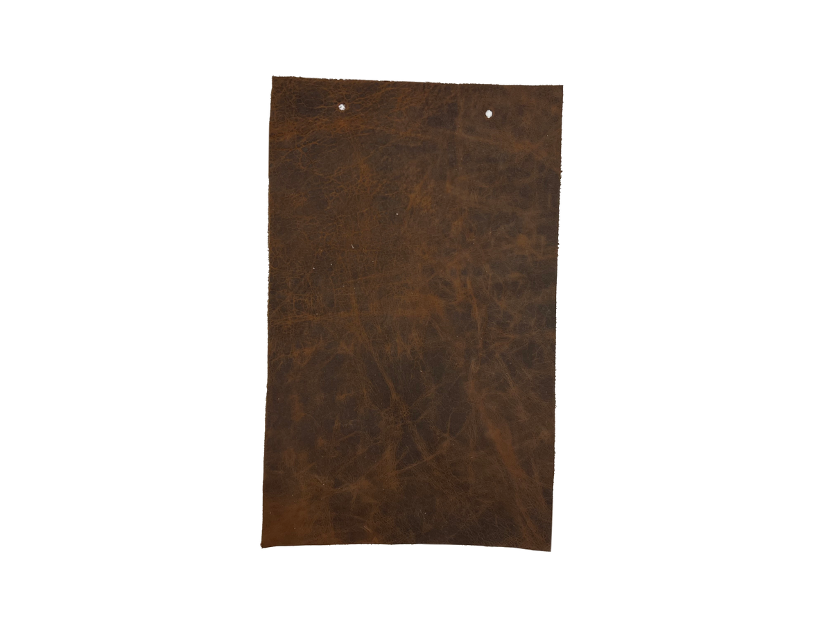 Cora Sierra leather swatch — rich dark brown heavily mottled pull-up custom upholstery option