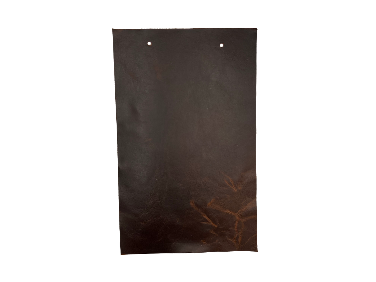 Cowboy Whiskey leather swatch — almost black dark espresso high-gloss warm amber undertones custom upholstery option