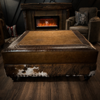 Brown leather ottoman with cowhide pattern in front of a fireplace in a cozy room.