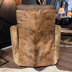 Brown leather recliner with cowhide arms and back.