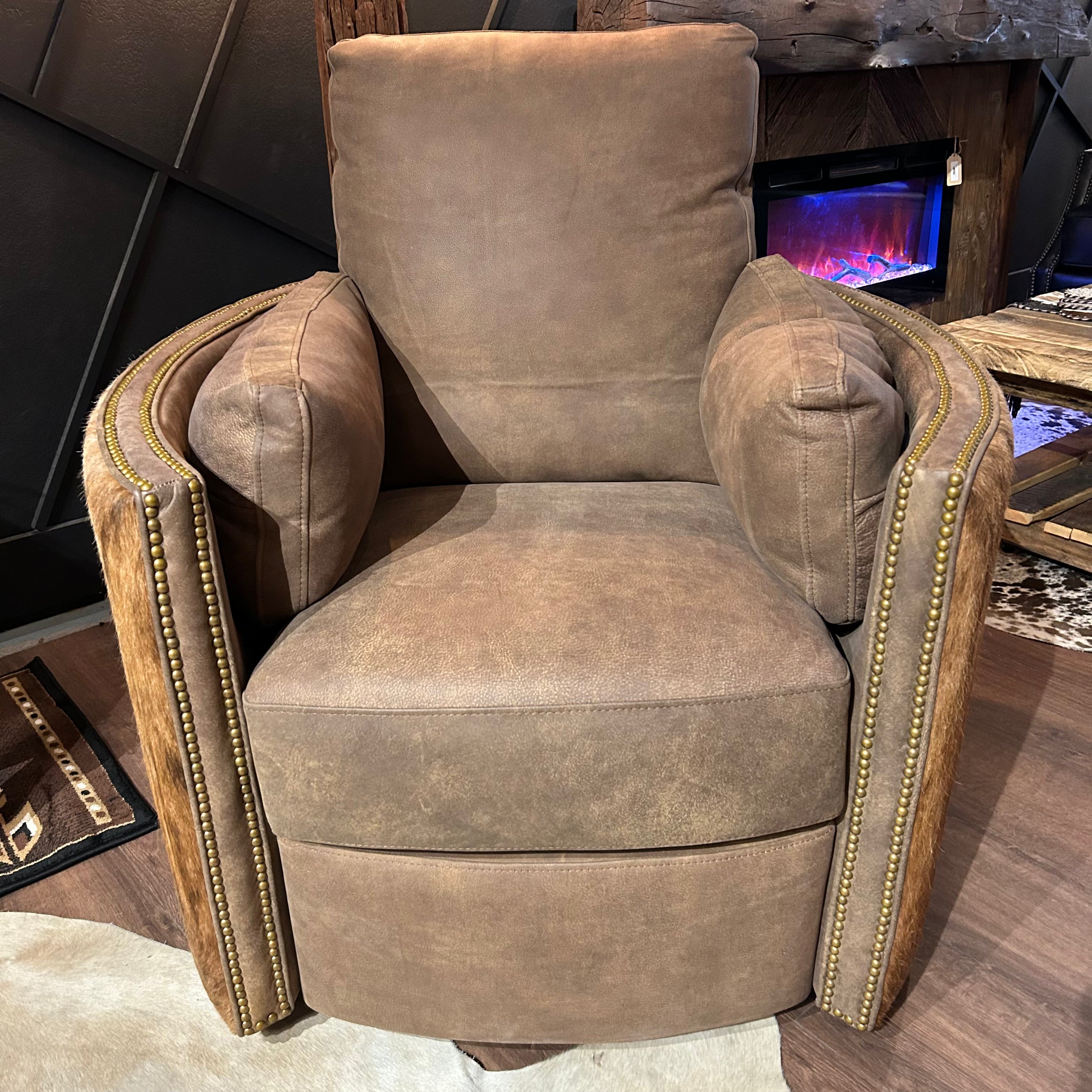 Brown leather recliner with cowhide arms and back.