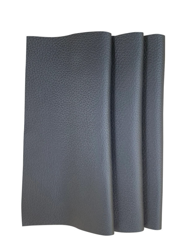 Chanel Raven leather swatch — deep charcoal-black leather with subtle natural grain