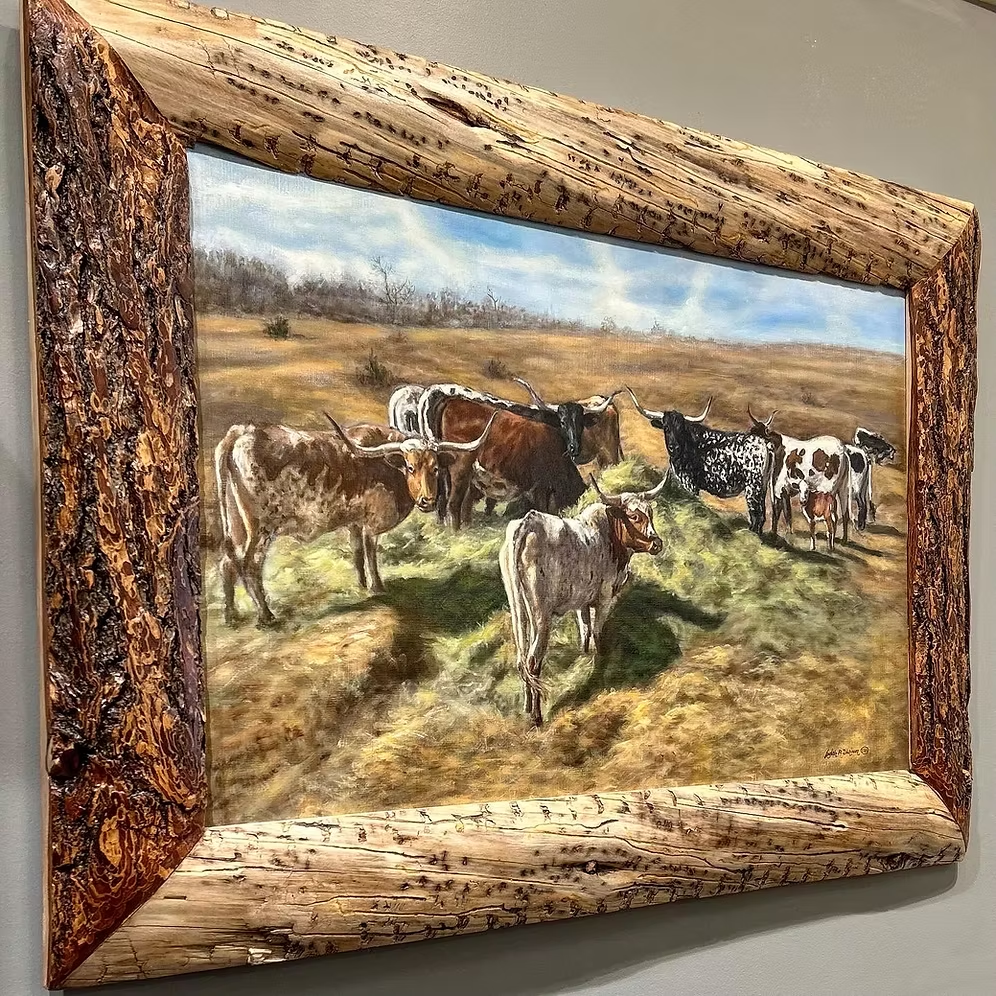 Angled view of Gathering painting with its textured beetle kill pine frame